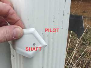 Shaft and pilot hole in strap