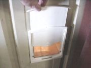 Outer door secured to sheet metal siding