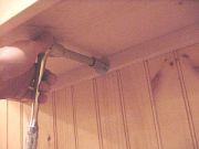 Bolt the shelf to the wall studs