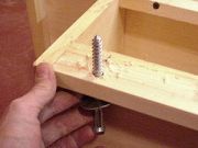 Drill holes for lag bolt and washer