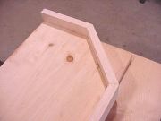 Underside of top shelf showing banding assembly