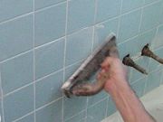 Float grout with sponge trowel