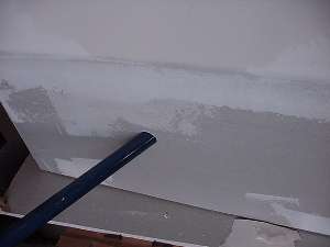 Handle in wall