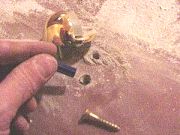Drill holes in concrete for screw and pin