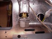 Turn oven brass orifice to bottom of seat