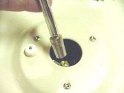 Use a nut driver