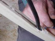 Strip sheathing on pump cable