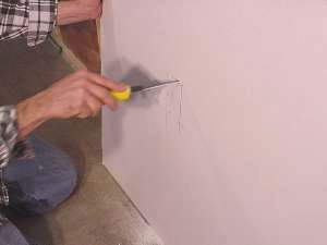 Using hole saw to cut out for electrical box