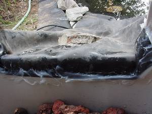 Use ample amounts of silicon caulk to seal edge