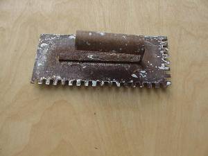 Notched trowel