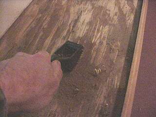 Scrape wood window sill